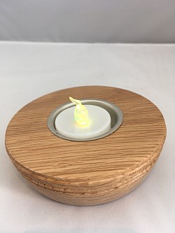 Tea light holder turned in oak.