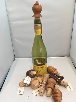 More bottle stoppers in a variety of wood