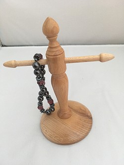 A turned bracelet stand