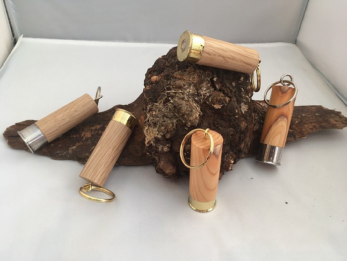 Key rings turned from oak and yew wood using spent shotgun cartridges