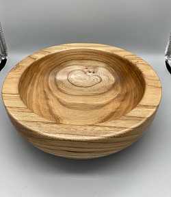 A commission for an Elm bowl with a 1” rim.